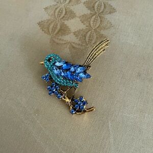 Blue bird brooch
